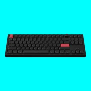 Keychron Q3 Max gaming keyboard on a blue background.